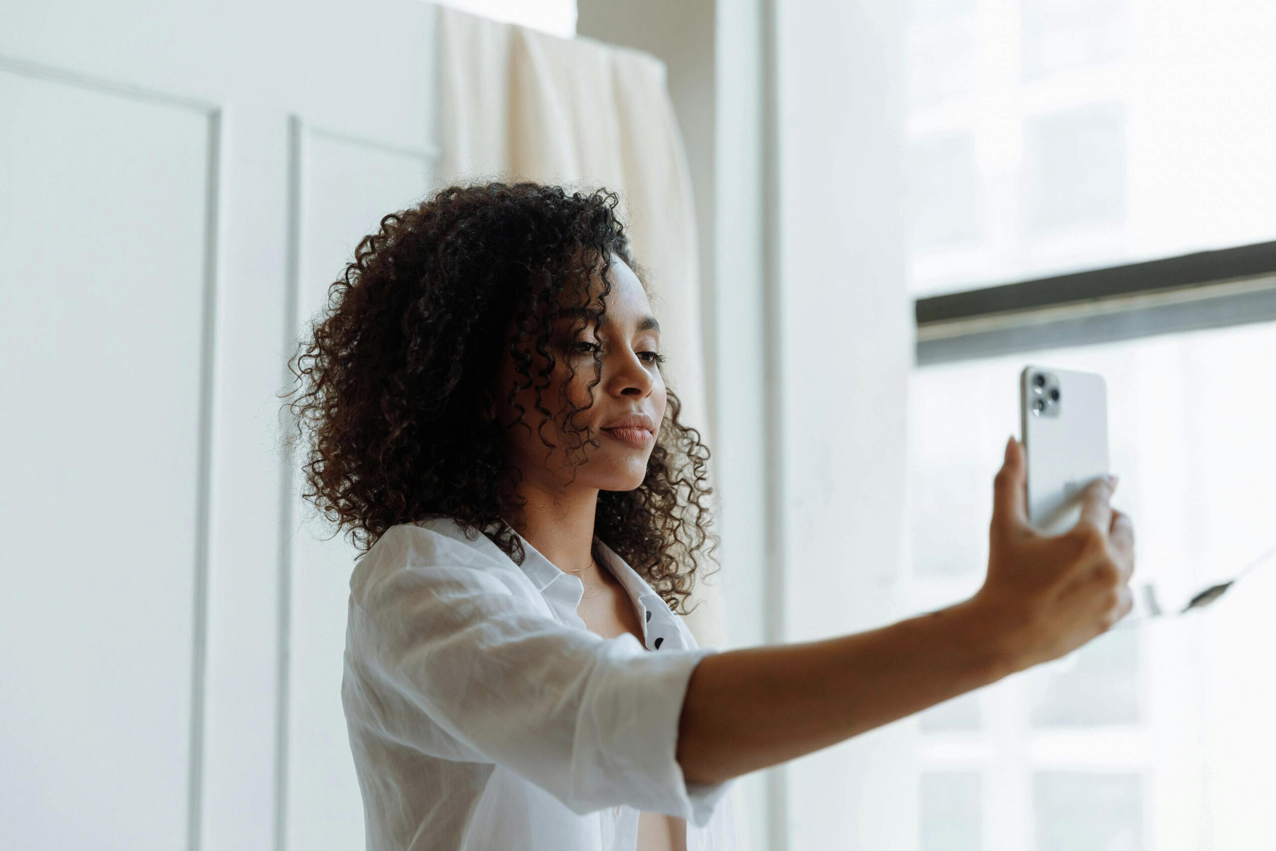 a woman taking a selfie